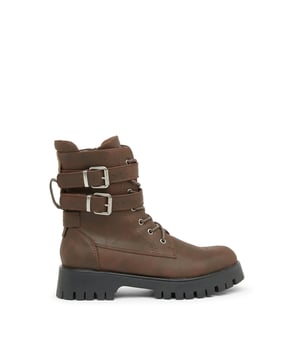 The Tatton double-strap biker boots have chunky soles, designed to make a statement this winter.  These boots will also outfit perfectly with floral midi-dresses but are also the ideal partner for moodier black dresses with gothic lace.
