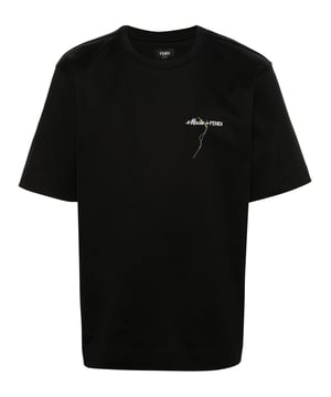 Regular-fit short-sleeved crew-neck T-shirt. Made of black cotton. Embellished with Made in Fendi lettering embroidered on the chest.
