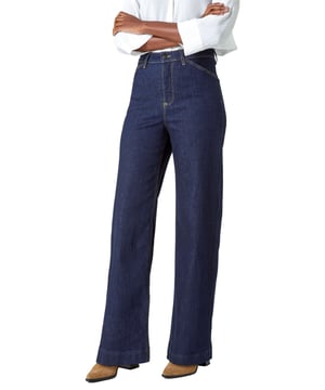 Cotton Blend Wide Leg Stretch Jeans from Roman. A key on-trend staple for the season ahead, these wide-leg denim jeans are both stylish and versatile. Cut from a comfortable cotton blend denim, these jeans feature a secure zip and button fastening, as well as functional belt loops. It has both front and back pockets for a practical edge. Designed in a fashion-forward wide-leg shape, these jeans can be dressed up or down with ease. Pair with a ribbed turtle neck jumper, heeled boots and a smart jacket for a chic, everyday look!
