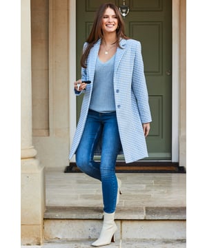 REASONS TO BUY:

Outerwear with wow factor
Forever-on-trend dogtooth check
Longline hem for extra cosiness
Chic collar and covered button front
Effortlessly chic with jeans and a jumper