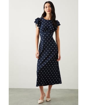 You've got the plans, we've got the dresses. From midi dresses to maxi dresses, bridesmaid dresses and everything in between, we've got you covered for every event in the social calendar. Whether you're after occasionwear for a special event or updating your work attire with a simple shirt dress, you'll find a range of amazing styles and silhouettes at DP. Style: Navy Spot Print Ruffle Sleeve Empire Midi Dress Length: Approx. 125cm Fit: Relaxed Ideal for: DaywearDesign: Ruffle Made in the UK