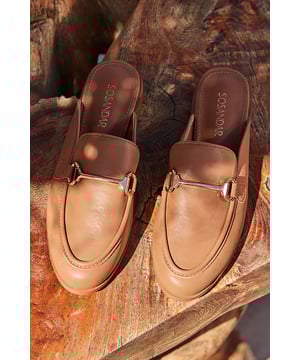 Dress from the feet up
Easy slip-on backless style
Wear-with-everything neutral
Timeless snaffle trim detail
They'll take you from work to weekend
We love them with white denim or linen trousers