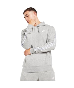 Freshen up and step out in this men's Aries Hoodie from Nike. In a Grey colourway, this regular-fit pullover is made from a soft cotton and poly blend for lasting comfort. It has a drawcord-adjustable hood for custom coverage, stretchy ribbed trims to hold the shape and a kangaroo pocket for your essentials. Finished up with taped Nike branding down the sleeves and a Nike Futura badge embroidered to the chest.