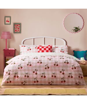Introducing the Cherry Gingham Duvet Cover Set—a delightful blend of classic charm and modern flair perfect for those who cherish individuality. Crafted from high-quality 68 Pick Polycotton, this reversible duvet cover promises comfort and style in equal measure. The timeless gingham pattern is playfully adorned with bold red cherries, adding a touch of whimsy to your bedroom decor. Whether you're a positive thinker or someone who values unique self-expression, this bedding invites you to create a personal sanctuary that reflects your vibrant personality. Experience the joy of modern design with a touch of tradition, ensuring restful nights and chic aesthetics.
