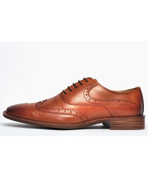 A wardrobe staple, these Catesby England Remington mens brogues are sure to elevate your smart-casual attire. The premium leather upper features classic punch hole detailing and intricate designer stitching, all in an on-trend colourway designed to impress. A slimline outsole completes the look and ensures sophisticated looks and increased traction. 
 - Leather upper
 - Classic brogue detailing throughout
 - Lace up fastening for a secure fit
 - Sturdy rubber outsole
 - Catesby England branding