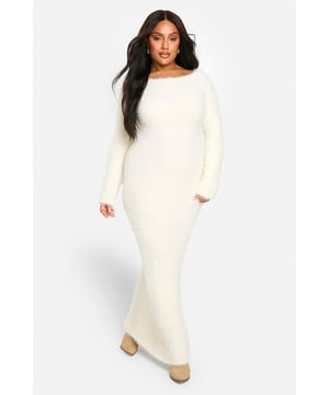 A longline style that lengthens your silhouette and skims your curves for a super flattering look, create the fit you've been dreaming of this season with this plus size maxi dress. A versatile piece you can dress up with heels or keep casual with sliders, plus size long dresses are a wardrobe saviour when you don't know what to wear. Updated for the new season with floral prints, as well as some jersey pieces to keep your lounge style on lock, invest in a plus size floor length dress (it will look good on you).Style: Knitted DressFabric: AcrylicLength: MaxiSleeve Length: Long Sleeve