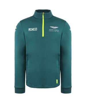 La camiseta Aston Martin F1 Official Team Men's Green Midlayer es una prenda elegante y funcional diseñada para los entusiastas de la Fórmula 1 y los seguidores del Aston Martin Cognizant F1 Team. Estas son las principales características de esta capa intermedia para hombre:

 Mercancía oficial del equipo:  Esta capa intermedia es mercancía con licencia oficial del equipo Aston Martin Cognizant F1, lo que garantiza que representa la marca y la calidad del equipo.

 Diseño verde:  La capa intermedia es predominantemente verde, lo que refleja el color característico del equipo y añade un toque deportivo y elegante a tu atuendo.

 Estilo de la capa intermedia:  Una capa intermedia suele estar diseñada para proporcionar una capa extra de calidez y comodidad sin ser demasiado voluminosa. Es ideal para llevar debajo de una chaqueta o encima de una camiseta.

 Marca del equipo Aston Martin F1:  La capa intermedia suele llevar la marca del equipo, incluidos logotipos y otros elementos asociados a la escudería de Fórmula 1, mostrando tu apoyo y pasión por el equipo.

 Cierre con cremallera: Suele incluir un cierre frontal con cremallera, que permite llevarla fácilmente y regular la temperatura.

 Construcción de calidad:  Los artículos oficiales de Fórmula 1 son conocidos por su calidad, y esta capa intermedia está diseñada para mantener su forma y estilo con el uso regular.

 Uso versátil:  Tanto si asistes a una carrera de F1 como si la ves desde casa o simplemente sigues con tu día a día, esta capa intermedia ofrece calidez y estilo, permitiéndote expresar tu pasión por el deporte y el equipo.

 Uso diario:  Aunque es perfecta para los eventos y carreras de F1, esta capa intermedia también es adecuada para el uso diario, añadiendo un toque deportivo y de moda a tu atuendo diario.