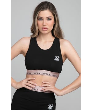 inchSikSilk Roseate Bralette - BlackLuxury vibes in our Roseate range that uses rose gold taping.Matching items availableBodycon racerback fitSoft touch fabricRose gold satin effect branded tapeEmbroidered logoMachine wash95% Cotton 5% ElastaneModel 5ft 10in and wears a size Small inch