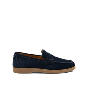 Loake Lucca Navy Suede Loafer Navy
The Lucca is a premium Suede loafer, featuring cemented rubber soles for greater longevity and grip. Made on the Tuscan is a standard-length last, featuring a more casual rounded toe shape. This last generally runs true to size. Navy suede is easy to style and perfect for the summer months.

Suede Loafer
Tuscan Last
Casual Style