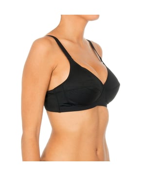 Wireless bra.
 Cups without foam.
 Elastic and adjustable straps.
 Excellent support for an impeccable silhouette.
 Back closure with four-position hooks.
 Elastic sides.
 Seams seen in tone.
 Composition: 77% Polyamide, 23% Elastane
 Care:
Care:
 - Handwash.
 - Do not use bleach.
 - Do not use dryer.
 - Do not iron.
 - Do not dry clean.