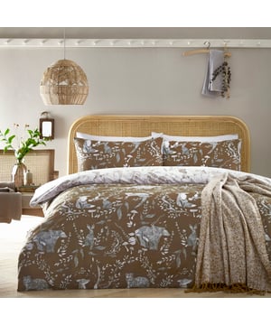Explore our cosy and delicate take on the beauty of woodland creatures as you rest in the Buckthorn duvet cover set. Hand-drawn rabbits, foxes and bears pose among the delicate florals, which are set on an earth toned background. Flip the set over and the same design appears, but this time in inverted colours, giving you a fresh, evergreen look. An adorable and down to earth addition to your bedroom.
