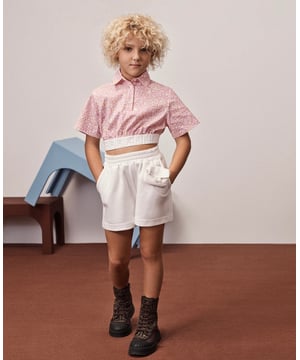 Fendi embody high quality craftsmanship designs with refined elegance. These girls shorts amplify the luxury Italian label's preference for sleek, unparalleled fits. Crafted in a beautiful high quality cotton with an elasticated waist, side pockets and 3D shorts with a purse. She will be obsessed. 100% Cotton