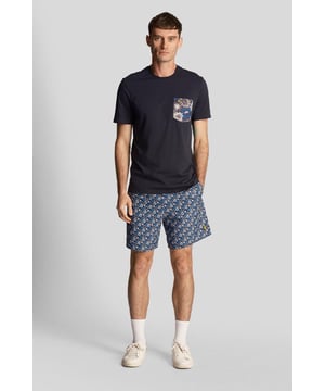 Designed to be worn with a plain tee or the matching floral print shirt, these mesh-lined resort swim shorts, with fast-drying fabric, deliver the iconic Lyle & Scott style both in and around the pool.