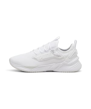 PRODUCT STORY: Hit the streets at pace in the Retaliate 3. The upper features a modern burrito construction in the collar, ensuring a perfect fit and enhancing ease of entry. Zoned rubber on the outsole provides traction in key areas while a colour dam allows for unique PUMA branding to pop in the rubber.  FEATURES & BENEFITS: The upper of the shoes is made with at least 20% recycled materials, SOFTFOAM+: Step-in comfort sockliner designed to provide soft cushioning thanks to its extra thick heel. DETAILS: Lace closure, Breathable mesh upper, Upper with burrito-construction collar, Heel TPU wings, Heel-to-toe drop: 8mm, Surface type: Road running, Recommended for: neutral pronators,