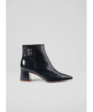 Bored of your black winter boots? Then may we introduce you to our latest recruit for spring/summer, the Missy ankle boots? The perfect transitional style, they're beautifully made in Spain from glossy and textural crinkle patent leather in navy blue, and they have a pointed toe, double buckle detail to the ankle, an inside zip and a 60mm block heel. Tres chic for everyday endeavours, but also comfortable whether you're running around town or running for the bus.