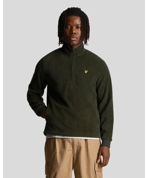 Short funnel neck.Quarter length rubber-tipped zip.Set-in sleeves.2 side pockets.Double stitched hem.Regular fit.