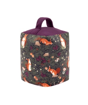 Add some fun to your woodland home interiors with the Pineberry Forest door stop. This design features handsome red squirrels going about their day through dense pine woods. Perfect for nature lovers and nutty animal enthusiasts. Complete with a complementing velvet base and storage handle, this doorstop is filled with polyester and sand for added weight. Size: 12cm x 12cm x 18cm.