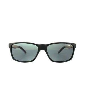 Arnette Sunglasses Slickster 4185 41/81 Black Grey Polarized have a flexible grilamid frame on this simple rectangular shape with a raised Arnette logo on the temples.