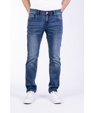 Slim-Fit-Jeans in softem Jog-Denim. Six-Pocket-Stil. In verwaschener Optik. Reißverschluss und Knopf vorne.