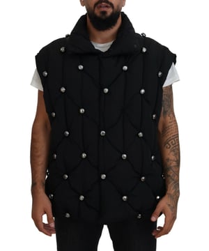 Marca: Dolce & Gabbana  
Chaleco sin mangas  
Color: Negro  
Detalles de logo  
Hecho en Italia  
Material: 100% Poliamida  
Forro: 100% Poliéster  
Material: 100% Poliamida  