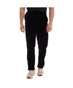 Velvet trousers by Emporio Armani, designed for those looking for a garment of high sophistication and impeccable style.

 Crafted from high-quality black velvet, it offers a soft and luxurious texture, ideal for standing out on formal or semi-formal occasions.

 It features a hidden hook and button closure instead of a zipper, also hidden, providing an elegant and minimalist finish.

 Slanted side pockets add a functional touch, while back welt pockets with button closures complete the design with a classic feel.

 These Emporio Armani pants are the perfect choice for those who want a combination of comfort, exclusivity and timeless style.
 Composition: Fabric: 76% Viscose, 26% Elastane; Lining: 65% Acetate, 35% Viscose
 Care:
- Machine wash on delicate cycle.
 - Use similar colors in the wash.
 - Avoid the use of bleaches.
 - Do not dry.
 - Iron at low temperature.
 - Do not dry clean.