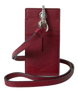 <ul>
  <li>Tarjetero con cordon de cuero rojo 100% autentico de Dolce & Gabbana</li>
  <li>Parche con el logotipo en relieve en la parte trasera</li>
  <li>Correa de cordon y ranuras para tarjetas</li>
  <li>Hecho de cuero 100%</li>
  <li>Color rojo llamativo</li>
  <li>Detalles del logotipo de Dolce & Gabba</li>
</ul>