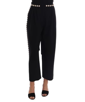 Merk: Dolce & Gabbana  
Model: Hoge taille, losse pasvorm, enkel lengte  
Materiaal: 86% Wol, 6% Katoen, 4% Acetaat, 4% elastaan  
Kleur: Zwart met gouden metalen details  
Sluiting: Rits en knoopsluiting  
Kristal: Duidelijk  
Motief: SICILIË  
Tailleband  
Met kristallen ingelegde taille en zijlijn  
Logo details  
Gemaakt in Italië  
Zeer exclusief en hoog vakmanschap
