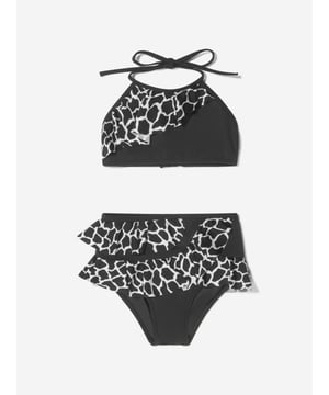 Unveiling the Girls Tinto Bikini (UV50 Sun Protection) by Nessi Byrd, an ultimate showstopper for your little girl's summer wardrobe. Key features: Elegant Design: Crafted to perfection with a designer finish, mixing style with sun protection for your little diva.  UV50 Sun Protection: Maximum protection against harmful sun rays, offering carefree fun under the sun. Luxurious Comfort: Made from unique, high-end fabric for unrivalled comfort and durability, withstanding countless beach adventures.  Unrivalled Quality: A product of Nessi Byrd's renowned quality, prepare to dazzle at the beach with this designer piece. Order now, upgrade your little girl's summer style!