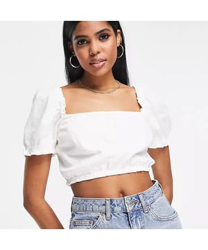Floral embroidery  Square neck  Puff sleeves  Stretch shoulders, cuffs and hem  Cropped length  Regular fit  True to size
Main: 100% Cotton
