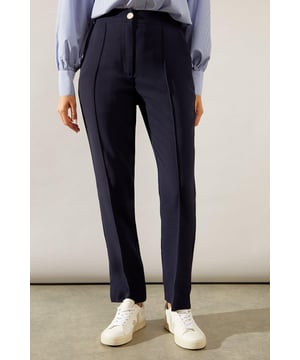 Tapered fit for a sleek silhouette
        Elegant split hem detail
        High-waisted design for a flattering fit
        Versatile style suitable for smart and casual occasions
        Comfortable stretch fabric for all-day wear
    
    These split hem tapered trousers from Wallis are the epitome of sophisticated style with a modern twist. The tapered fit creates a streamlined look that flatters your figure, while the split hem adds a touch of contemporary flair. Perfect for the woman who values both comfort and elegance, these trousers can effortlessly transition from day to night. Pair them with a crisp button-down shirt and blazer for a polished office ensemble, or dress them down with a silk blouse and statement jewellery for evening drinks. The high-waisted design not only accentuates your waistline but also provides a smooth foundation for tucked-in tops. Whether you're attending a formal event or aiming for a smart-casual look, these versatile trousers will ensure you always look put-together and feel confident.