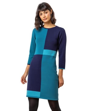 Colour Block Knitted Dress from Roman. Go for bold with your everyday style in this shift dress. Channelling the trendy colour block trend, this flattering dress features a striking print, round neck and 3/4 sleeves. Perfect for the office or an evening with your friends.
