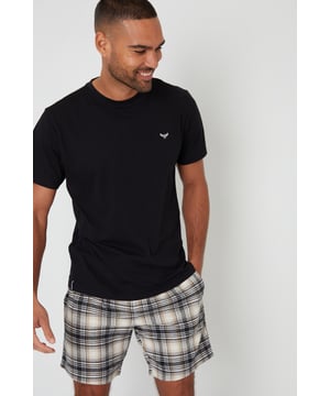 Give your loungewear an upgrade with this in this soft, cotton blend shortie pyjama set. This lounge set features a short sleeve, crew neck t-shirt that has the signature Threadbare logo embroidery to the chest, and check flannel shorts with an elasticated waistband with drawcords and two side entry pockets. Layer with a soft dressing gown if needed on cooler mornings, or with a casual hoodie for sofa days.