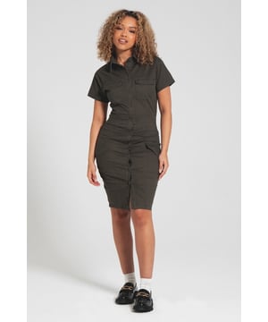 Step into effortless style with the 'Perse' short sleeve cargo dress by Bench. Boasting a smart shirt collar, convenient button-down fastening, and practical chest and side pockets, it seamlessly blends fashion and function for any outing. Elevate your wardrobe with this versatile piece, designed to keep you chic and prepared for every moment.