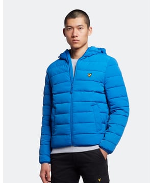 Crafted from highly durable and soft polyester, the Lyle & Scott Lightweight Puffer Jacket is the perfect transitional jacket for navigating the changing seasons in style. This lightweight jacket pairs with almost anything, whilst its elasticated cuffs and adjustable hood will have you ready to face the elements. Finished with front pockets, detail stitching, and our Golden Eagle. \n \nFit: Regular\nIt is crafted to fit the body neither too tightly or too loosely, leaving you with a classic, timelessly stylish look. We recommend you order your usual size, but if you're caught between two, go a size up.