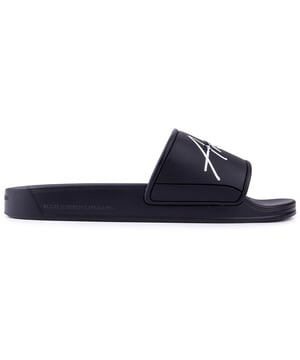 Luce fresco e informal en la piscina, en la playa o mientras descansas con estas chanclas negras para hombre de Android Homme Laguna Beach. Esta sandalia de diseño presenta una correa ancha con la marca y una plantilla moldeada. Relájese con estilo, de vacaciones o en casa.