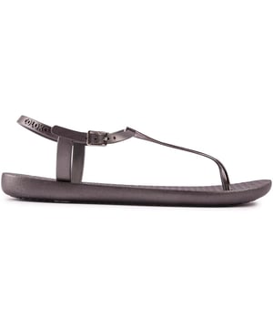 Dale a tu look junto a la piscina el toque de Midas con estas sandalias con tira para el dedo metálicas oscuras Sakura de Coloko. El ligero. Los zapatos resistentes al agua están acabados con una correa de tobillo con la marca en oro intenso y ofrecen un toque elegante. mirada tranquila.