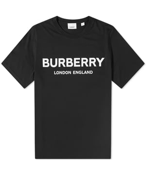From sightseeing in London to shopping in Milan, you’re guaranteed to turn heads in this black Burberry cotton tee. It’s boldly printed across the chest with Peter Saville's text logo that reads “BURBERRY LONDON ENGLAND” in bright white, in honour of the fashion house’s British heritage.

100% Cotton
Ribbed Crewneck