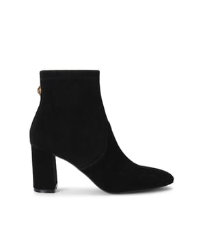 The Kurt Geiger Langley Ankle Boot features a black suede upper. The ankle features a zip closure and antiqued brass eagle head on the back. Heel height: 8cm.