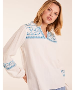 This delicate embroidery puff sleeve blouse brings a touch of elegance to your everyday wardrobe - we love wearing it with light denim. 
100% Cotton