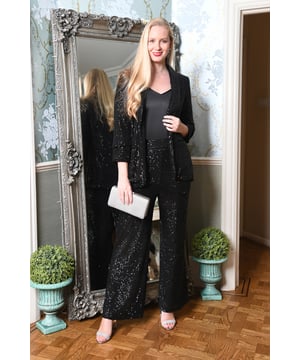 Blazers are this season's must have and this unique Yumi Black Sequin Blazer With Pockets is a total showstopper. Glitz and glam is back and this long, all-over sequin studded blazer adds the wow factor to any fit. With roomy pockets and a centre-back split. Pair over black jeans and heels to complete the look.
