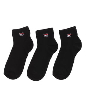 Fila F9303 unisex ankle sock.
 Pack of 3 Unisex ankle model from the Fila brand, with the logo on the ankle.
 Made with high quality yarns, which guarantee great comfort and durability.
 They adapt perfectly to the shape of the foot, with a comfortable fit at the ankle level.
 Stretch fabric offers great breathability to keep skin dry and cool.
 Composition: 75% Cotton; 23% Polyester; 2% Elastane
 Care:
Machine wash at maximum 30º.
 Do not use bleach.
 Do not use dryer.
 It does not allow the use of an iron.
 Do not dry clean.