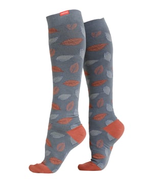 Energize your legs! Using integrally-knit graduated compression, these compression socks apply therapeutic pressure that starts at the ankle and gradually eases above. It’s this external pressure that energizes your legs and Reduces Swelling. These socks have a 15-20 mmHg compression level that is ideal for all-day, everyday wear, sitting or standing for long periods. High-quality premium cotton fibers and Spandex throughout the sock allow for sustained compression throughout the day. Alleviate achiness & heaviness by squeezing the legs from the bottom up, our legwear can help increase circulation of freshly oxygenated blood back to your legs. These are made for people with circulation problems and also ideal for flight travel, pregnancy, exercising, when sitting or standing for long periods of time and even during visits to hospital. These socks are specially designed to energise legs, reduce swelling, alleviate achiness & heaviness and to aid in muscular recovery. The specially designed fabric cotton blends and The 200-needle count gives supreme comfort and flexibility which contours leg and heel for superior fit. These socks are comfortable and breathable with graduated compression from ankle to calf with a contoured leg and heel for a great fit. The flexible toe pocket doesn’t squeeze the toes! They are also the extra wide style to fit comfortably around the wider legs and calves. Tested & Trusted: Based out of Missoula, Montana, VIM & VIGR is dedicated to creating products that provide you with everyday relief. VIM & VIGR graduated compression legwear was developed in partnership with vascular surgeons and vein clinics and all products are listed with the Food and Drug Administration (FDA). These compression socks are available in 17 colours and patterns and 3 sizes: Small/Medium, Medium/Large and Large/X-Large. They’re made out of 48% Cotton 42% Nylon, 10% Spandex and are machine washable.