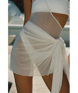 Our white sheer mesh sarong is more than just a cover-up, this stylish piece can be worn multiple ways, for every eventuality. Soon to be the most versatile piece in your holiday wardrobe, this sarong is ideal for barely-there clothing when the heat hits.