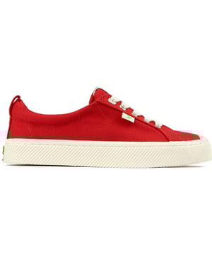 Step Into The Sunshine With These Bright Red Cariuma Oca Low Trainers For Eco-friendly Style And Comfort. These Lace-up Plimsolls Feature A Soft, Organic Cotton Canvas, A Cushioned Cork Plus Bio-based Foam Insole For Casual Comfort And A Sturdy Rubber Sole For Traction. The Shiny Silver Eyelets Add A Touch Of Glam. Embrace This Fashion-forward, Laid-back Design With A Good Conscience And Enhance Your Wardrobe With These Branded Skater Kicks.