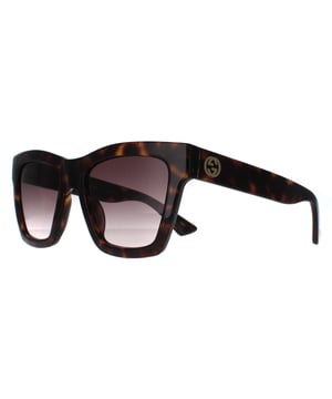 Gucci Square Womens Havana Brown Gradient GG1714S  Sunglasses are a masterful blend of modern sophistication and luxury, designed for those who appreciate bold fashion statements. With a distinctive, oversized frame featuring sleek, angular lines, these sunglasses add an edge to any look while maintaining an air of elegance. The iconic double-G logo on the temples underscores Gucci's legacy of impeccable craftsmanship and attention to detail. High-quality lenses offer excellent UV protection, ensuring comfort and safety under the sun. Available in an array of stylish colors, the GG1714S model is perfect for those looking to make a striking impression with an accessory that embodies both contemporary flair and timeless appeal.