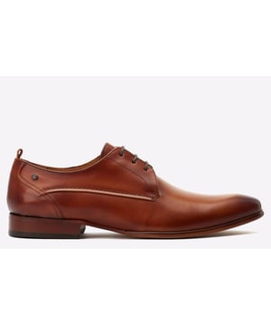 The Gambino Derby shoe features a 3-lace closure, clean plain toe design and exquisite stitching details. The cushioned Ortholite insole ensures comfort, while the slim formal resin sole adds a touch of sophistication to any outfit.- Quality Leather Uppers- Ortholite insole- Lace fastening- Slim Resin Sole