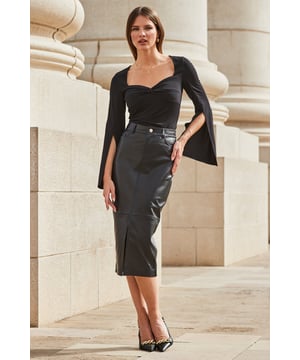 We consider it a wardrobe staple
Crafted from our signature butter-soft leather
Chic-meets-sexy pencil style
Slit hem for added sass
Add a silky blouse for the office
Style with a knit and knee-highs for relaxed glamour