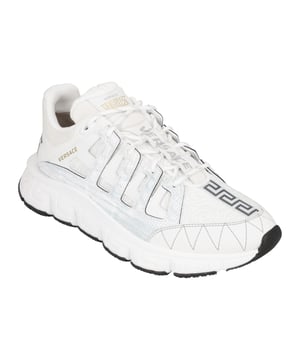Trigreca-Druck auf Zunge und Ferseneinsatz  
Gedruckte Mailand-Koordinaten  
Zickzack-Dekoration  
Greca-Gummisohlen  
Obermaterial: 100 % Polyester  
Innensohle: 100 % Polyester  
Sohle: 100 % Gummi  
Verzierungen: 100 % Leder  
Hergestellt in Italien  
Maßangaben:
