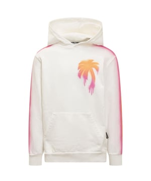 Palm Angels Sprayed Palm Tree Design White Hoodie. Experience cozy comfort and casual sophistication with the Palm Angels white jumper. Adorned with a stylish logo, this ultra-soft sweater is designed to offer all-day warmth and timeless style. Make a statement with this relaxed-fit sweater, perfect for everyday wear!.. Regular Fit, Fits True To Size. Palm Tree Logo and Large Brading, Spray Paint Design, Design Along Sleeves. 100% Cotton, Made In Italy. Style Code: PMBB117S23FLE012184