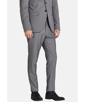 Deze pantalon is de perfecte keuze voor de moderne man die van stijl en elegantie houdt. De super slim cut is een zeer slanke pasvorm met een opvallende, elegante snit. Hij is gemaakt van hoogwaardig materiaal en heeft daardoor een hoog draagcomfort. De broek heeft een knoop- en ritssluiting. Ze hebben twee steekzakken aan de voorkant, paspelzakken met een knoop aan de achterkant en riemlussen. Deze broek is perfect voor een elegante look op kantoor of voor speciale gelegenheden.